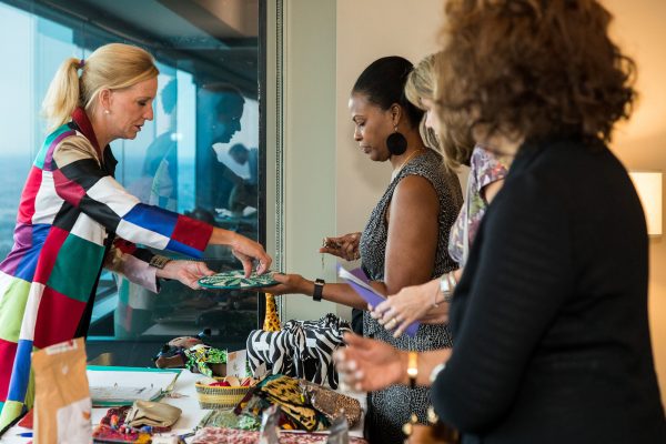 Dr. Susan Chambers volunteering at the pop-up shop during Leadership Development Gala 2018 Dr. Susan Chambers volunteering at the pop-up shop during Leadership Development Gala 2018