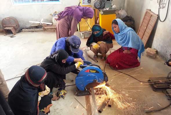 Latifa Majidi and her employees