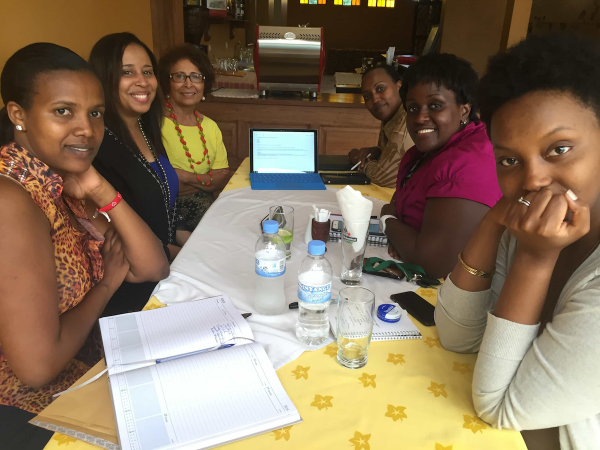 march 2016 kigali During the PEACE THROUGH BUSINESS® delegation trip to Rwanda in March 2016, volunteer Royalyn Reid, Dallas entrepreneur, worked with the Rwanda PEACE THROUGH BUSINESS® Alumnae Association on strategic planning and organizing. From Left: Lilian Uwukuri, Royalyn Reid, Billye Reyes, Chantal Munanayire, Lyliose Nduhungirehe and Sonia Ntukanyagwe. – March 2016, Kigali