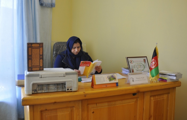 Humira Saqib works on her next project at the Afghan Women's News Agency; Kabul, Afghanistan.